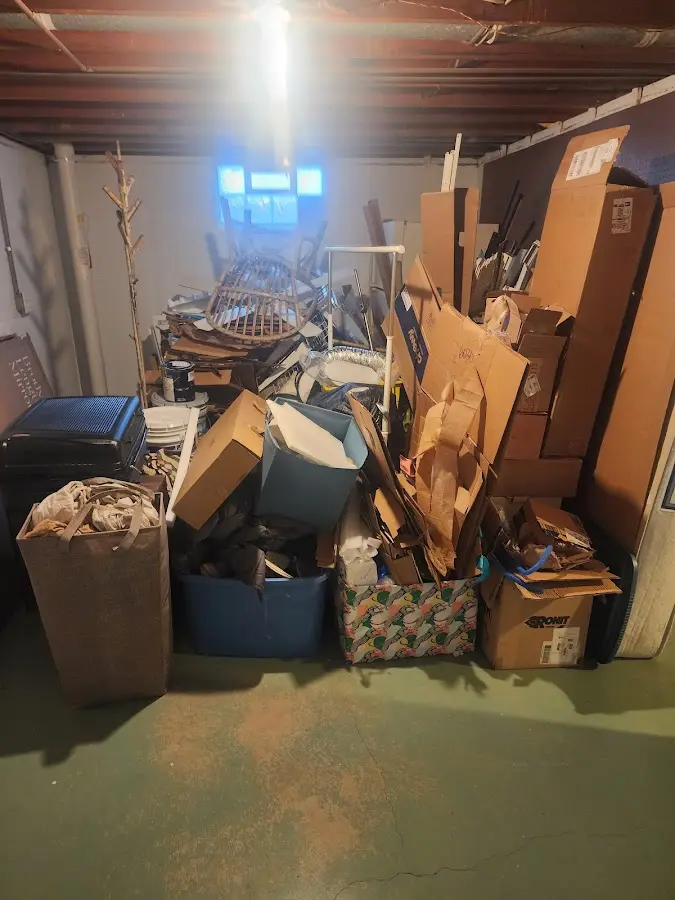 Roll-off dumpster container at job site for 2 Yard Dumpster Rental in Vidor